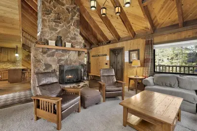 a living room with a couch and a fireplace at Crystal Pines at Big Bear Lake Walk to Boulder Bay Park Family-Friendly Retreat in Big Bear Lake