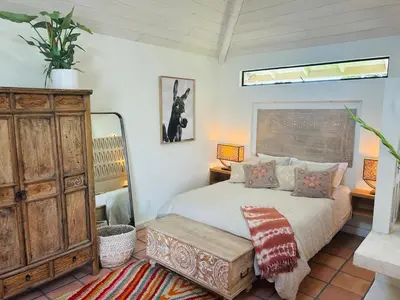 a bedroom with a bed and a wooden dresser at Ojai Serenity Retreat in Ojai