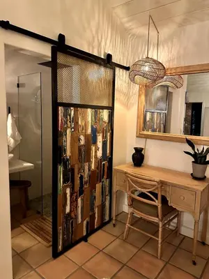 a room with a desk and a glass door at Ojai Serenity Retreat in Ojai