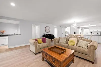 a living room with two couches and a coffee table at Serene Hilltop Oasis Above the City w Private Pool in Hacienda Heights