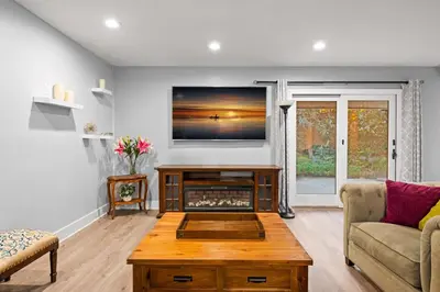 a living room with a couch and a table at Serene Hilltop Oasis Above the City w Private Pool in Hacienda Heights