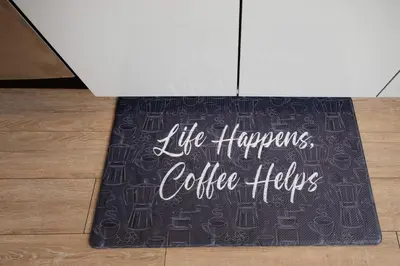 a sign that says life happens coffee helps on a floor at * Soho Vibes In The Heart Of Santa Monica * in Los Angeles