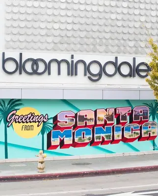 a sign on the side of a building at Laugh in the Lap of Luxury In SM * FREE Parking * in Los Angeles