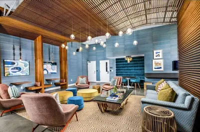 a living room with couches chairs and a table at Laugh in the Lap of Luxury In SM * FREE Parking * in Los Angeles