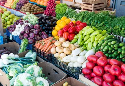 a display of fruits and vegetables in boxes at a market at * Sand & Surf In The Heart Of Santa Monica * in Los Angeles