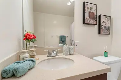 a bathroom with a sink and a toilet at Luxurious &Spacious 1Bed 1Bath Apt In Santa Monica in Los Angeles