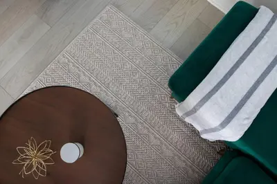 a room with a table and a towel on the floor at West Hollywood Luxe | 2BR/2BA Resort Style in Los Angeles