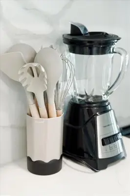 a container of kitchen utensils next to a blender at Santa Monica 1BR apt with Parking in Los Angeles