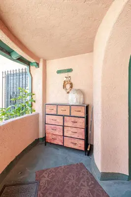 a room with a wooden dresser in a room with a window at Cozy 3-Bedroom Home in K-town Los Angeles in Los Angeles