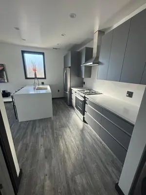 a kitchen with a sink and a stove top oven at Burbank - Starlight Hills Private Luxury Guest House in Burbank