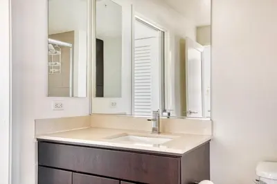 a bathroom with a sink and a mirror at Marina del Rey 2BR w Pool Gym nr beach LAX-636 in Los Angeles