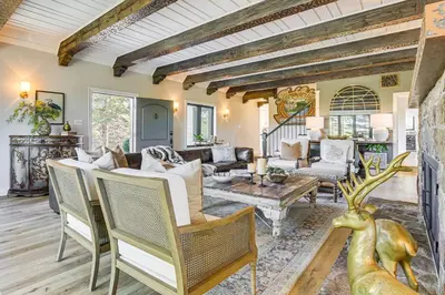 a living room with a couch and chairs at Walk to Lake Arrowhead Village! Home with Lake Views in Lake Arrowhead