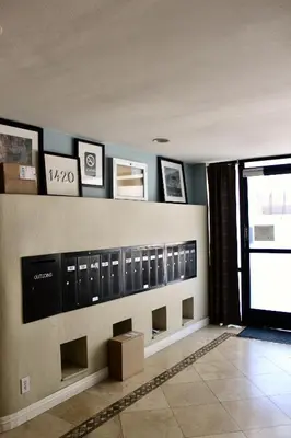 a room with a row of lockers on a wall at Designer Light-Filled WeHo Condo in Los Angeles