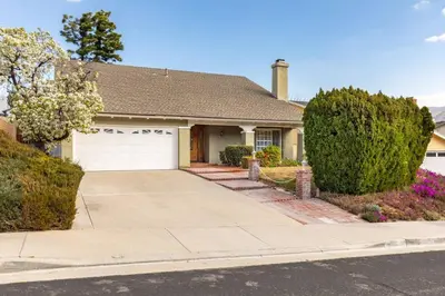 a house with a driveway and a garage at Goode HOMES Stunning Home w/ Beautiful Backyard in Santa Clarita