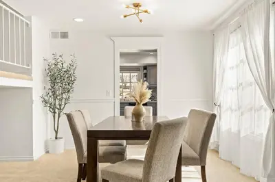 a dining room with a table and chairs at GOODE.HOMES | Luxury Home w/ Beautiful Garden in Santa Clarita