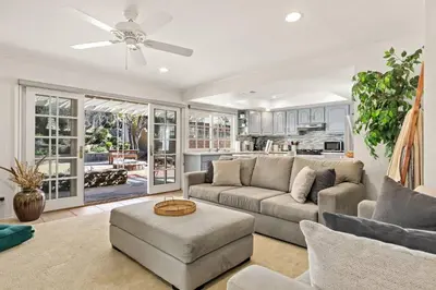 a living room with a couch and a ceiling fan at GOODE.HOMES | Luxury Home w/ Beautiful Garden in Santa Clarita