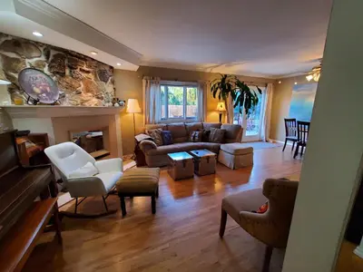 a living room with a couch and a fireplace at Hidden Gem In Plain Sight in Van Nuys Airport