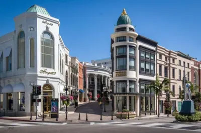 a street in a city with buildings and a clock tower at Private Apt with Queen bed in great neighborhood in Los Angeles