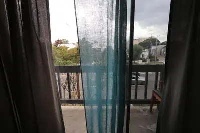 a window with a view of a street at Private Apt with Queen bed in great neighborhood in Los Angeles