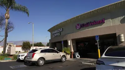 a car parked in front of a mall stand at Entire house with 3 rooms in Alhambra