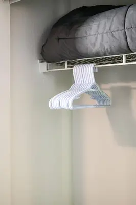 a bunk bed with a pillow on a shelf at Newly Remodeled 3BR Apt | Mins to Disney | Arcade in Placentia