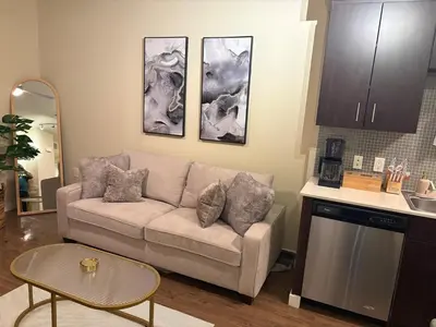 a living room with a couch and a table at Luxurious precious mile in Los Angeles