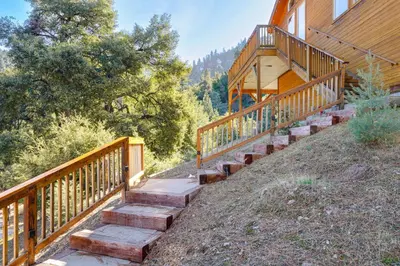 a set of stairs leading up to a house at PMC Mountainside Cabin Hit the Trails, Play Pool! in Pine Mountain Club