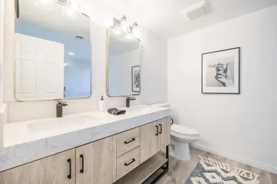a bathroom with a sink and a toilet at Marbella Lane - Serene Ranch Style Home wPool in Fullerton