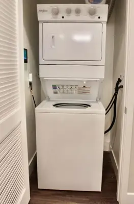 a white washer and dryer in a room at Casa Clementine - 10 min to SNA&Beach Plus Free Parking in Orange