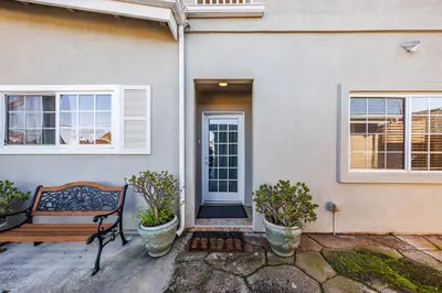 a bench sitting in front of a house at Welcoming & Spacious 2-Bedroom Guest Suite in Torrance 20 Minutes from LAX in Torrance