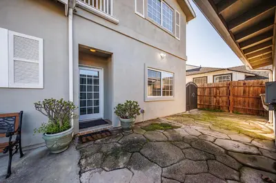 a backyard of a house with a fence at Welcoming & Spacious 2-Bedroom Guest Suite in Torrance 20 Minutes from LAX in Torrance