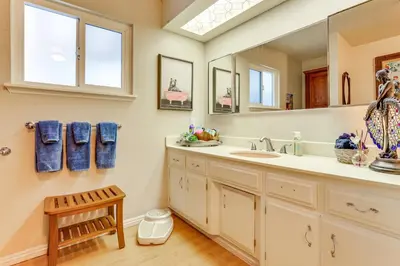 a bathroom with a sink and a mirror at Quiet Home Less Than 1 Mi to Lake Gregory and Dtwn Crestline in Crestline