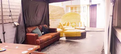 a living room with a couch and a table at Soul in Los Angeles close to Downtown in Los Angeles