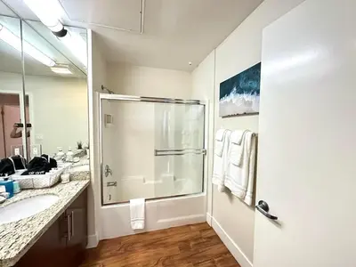 a bathroom with a shower and a sink at 2 King Beds DTSM! Walk to Pier, Promenade & Beach in Los Angeles