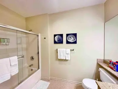 a bathroom with a shower and a toilet at Heart of DT SM Studio, Walk To Beach & Pier in Los Angeles