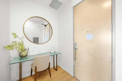 a dressing room with a table and a mirror at Marbella Lane - Panoramic Splendid Ocean Views in Long Beach