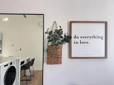 a picture of a plant on a wall with a picture at Marbella Lane - Lovely DWNTN Getaway LongBeach in Long Beach