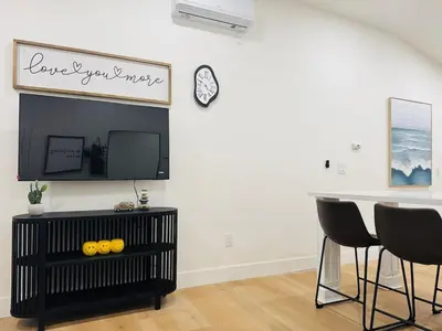 a living room with a table and two chairs at Marbella Lane - Lovely DWNTN Getaway LongBeach in Long Beach