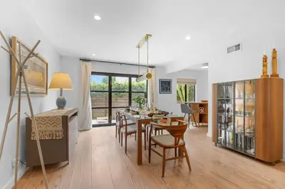 a kitchen and dining room with a table and chairs at New Listing Venice Villa by Colby & Conrad in Los Angeles