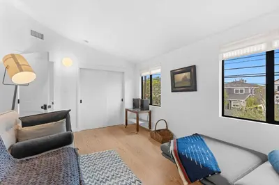 a living room with a couch and a window at New Listing Venice Villa by Colby & Conrad in Los Angeles