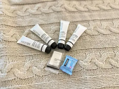a pair of mascara and batteries on top of a blanket at Cozy stay by Anatolian in Los Angeles