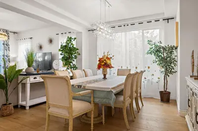 a dining room with a table and chairs at Luxury Hilltop Home Spacious Private Backyard in Rowland Heights