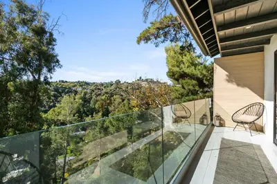 a view from the balcony of a house at New Listing Sunset Retreat by Colby&Conrad in Los Angeles