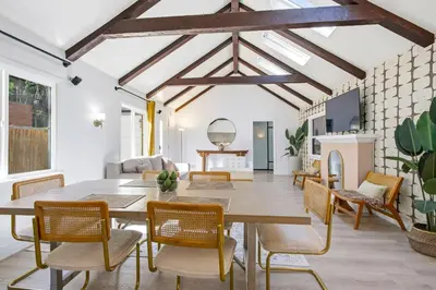 a dining room with a table and chairs at Bel Air Very Private and Comfy Home with Jacuzzi in Los Angeles