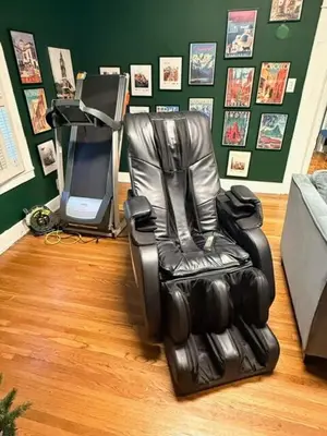 a black leather chair sitting next to a computer monitor at Larchmont 1875 sq ft house 3 bed 2 bathroom in Los Angeles
