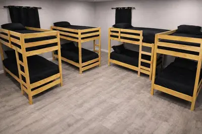 a group of bunk beds in a room at Hollywood Comfort Vibe LA in Los Angeles