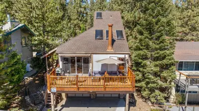 an aerial view of a house with a large deck at Lakeview Bear Cubs Den - Walk to Lake, Close to Slopes in Big Bear Lake