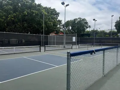 a tennis court with two tennis courts at LA Beach City Studio in Harbor City