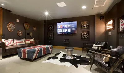 a living room with a couch and a television at Furnished Studio Apartment in Los Angeles
