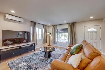 a living room with a couch and a table at Walkable Home Base Near LLUMC and Campus! in Loma Linda